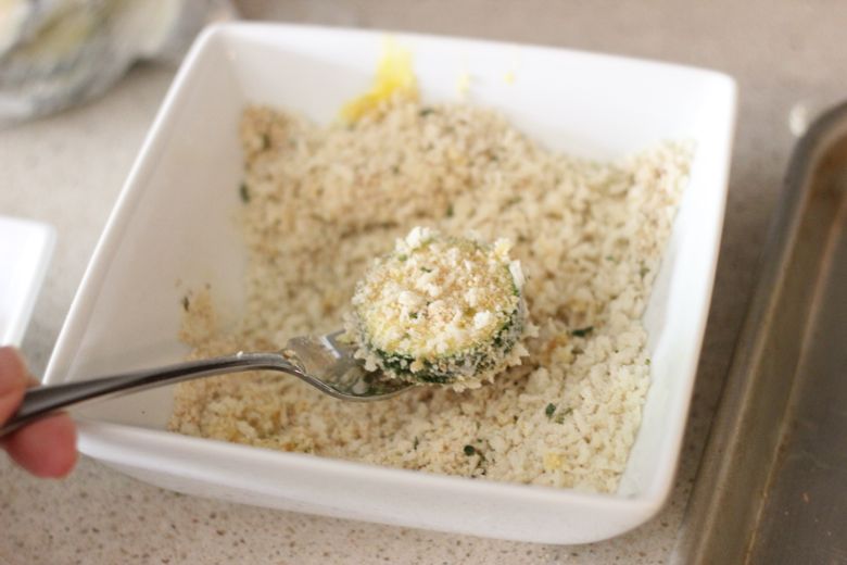 Zucchini slice coated with panko/breadcrumb mixture.  