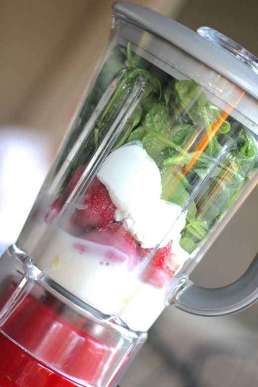 Green Smoothie ingredients in a blender.