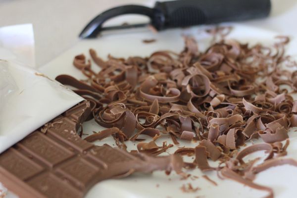 Milk chocolate bar and chocolate curls.  