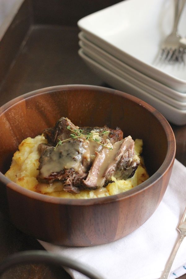 Slow Cooker Pot Roast and Make Ahead Mashed Potatoes in a bowl.  