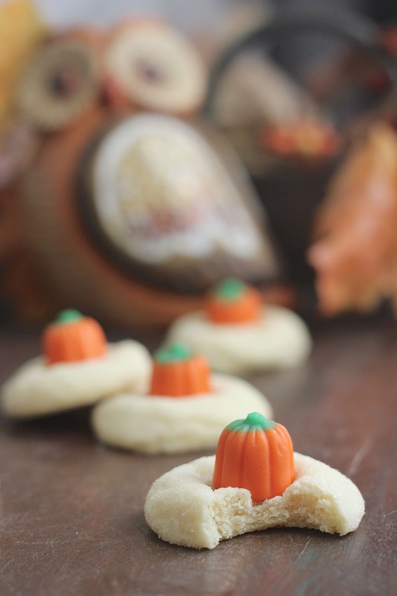 Mellowcreme Pumpkin Cookie with a bite taken out of it.  