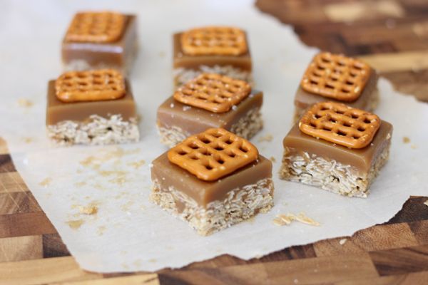 Salted Caramel Oat Bars sliced on parchment paper.  