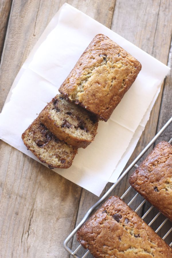Greek Yogurt Banana Bread loaf with two slices.  