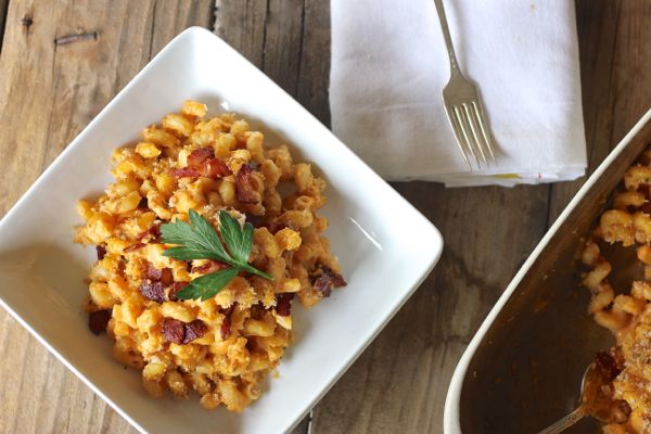 Pumpkin Mac and Cheese With Bacon in a bowl with garnish on top.  