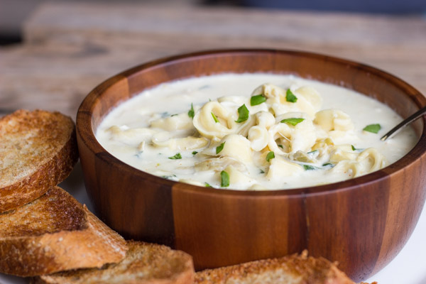 A creamy soup flavored with garlic, artichoke hearts, parmesan cheese, cream cheese, and cayenne pepper