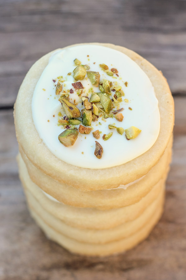 White Chocolate Pistachio Shortbread Cookies in a stack of five.