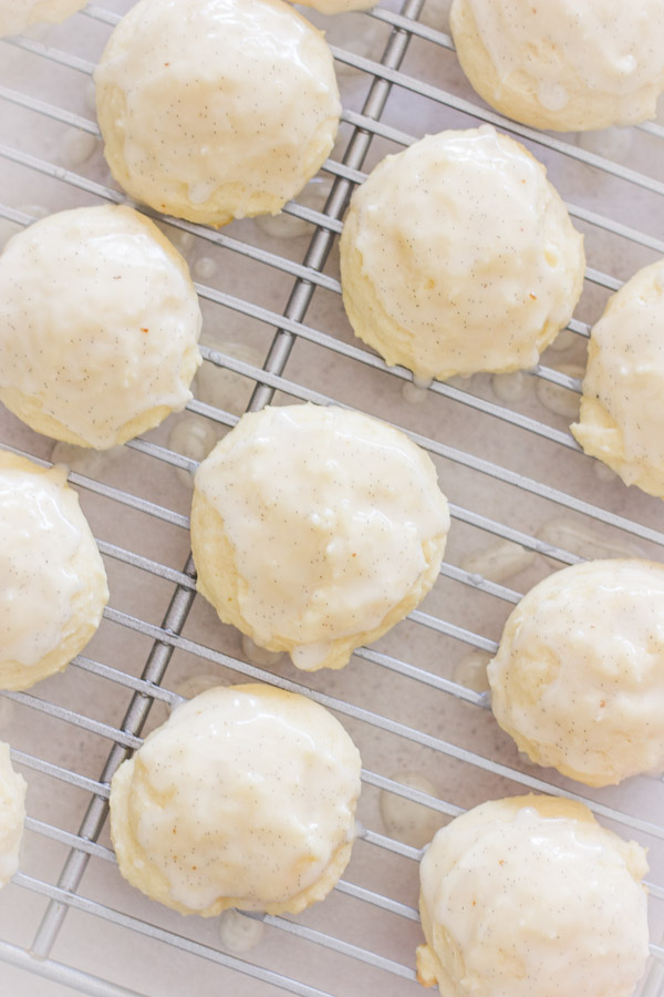 Soft Ricotta Cookies With Vanilla Bean Glaze on a cooling rack.