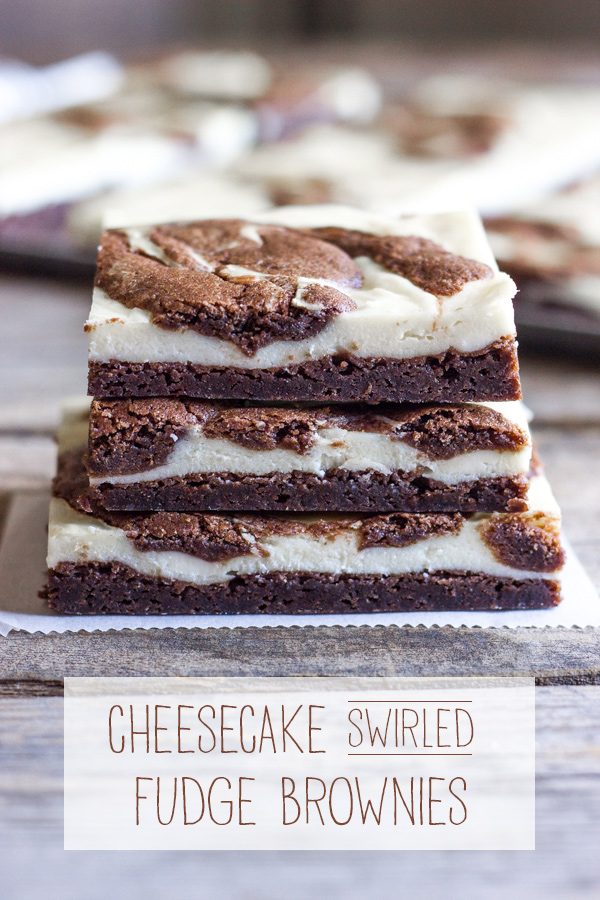 Cheesecake Swirled Fudge Brownies cut in squares and stacked in a pile of three.
