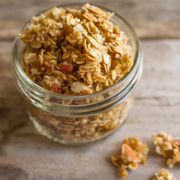 Wonderfully sticky and clumpy, this Homemade Coconut Oil Honey Almond Granola will make your day!