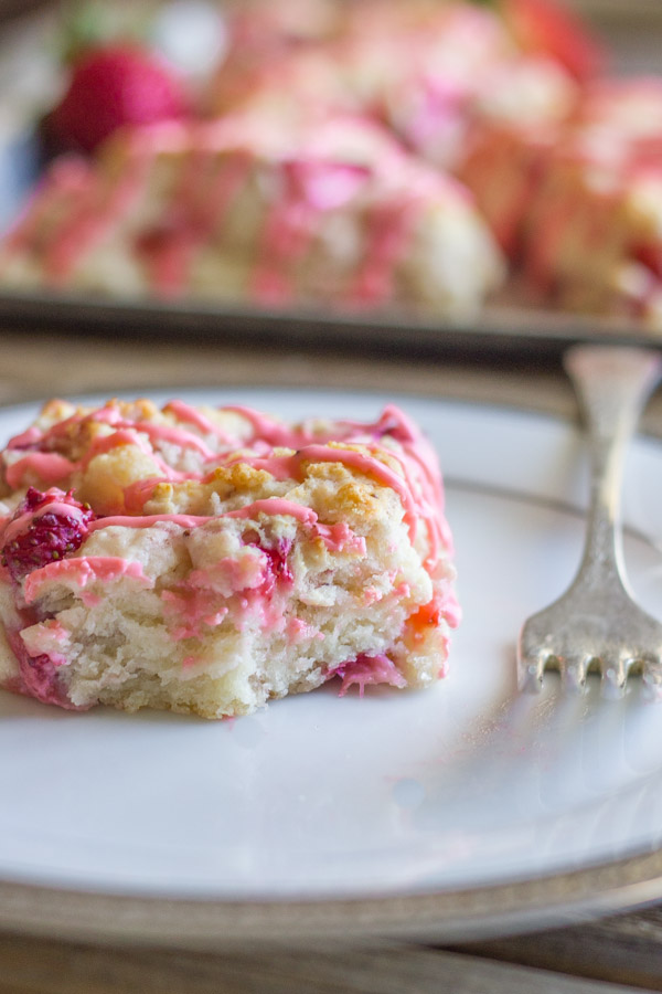 Dreamy Strawberries & Cream Scone on a plate with a fork.  