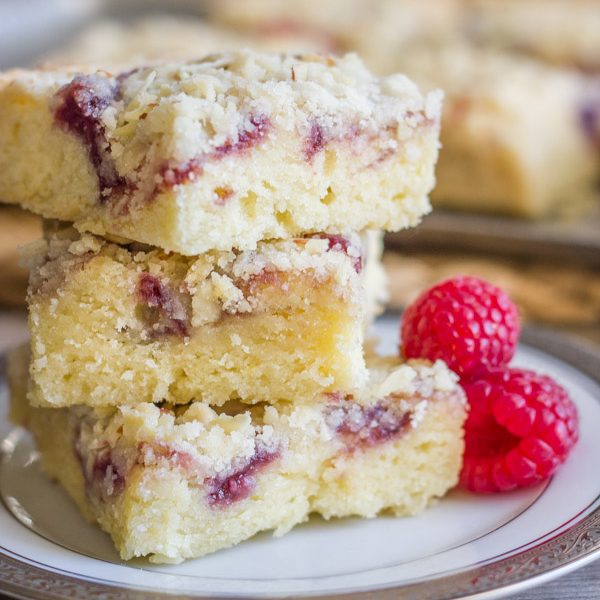 Moist, sweet, and full of almond flavor with a swirl of raspberry preserves and a crunchy crumbly crumb topping.