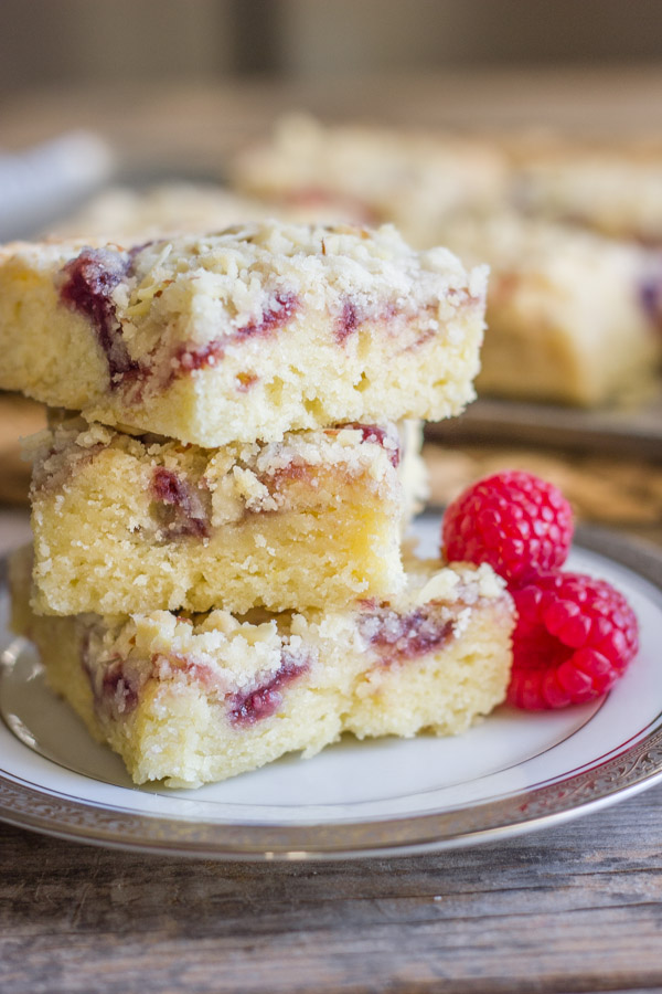 Moist, sweet, and full of almond flavor with a swirl of raspberry preserves and a crunchy crumbly crumb topping.