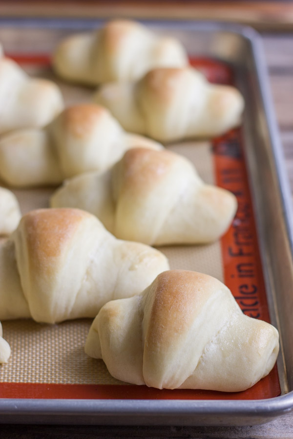 The Best Butterhorn Rolls on a Silpat lined baking sheet.  