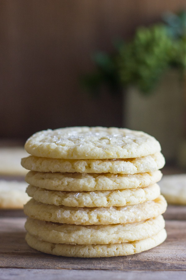A thin, delicate, buttery sugar cookie with a hint of lemon and a sprinkle of sparkling sugar on top.
