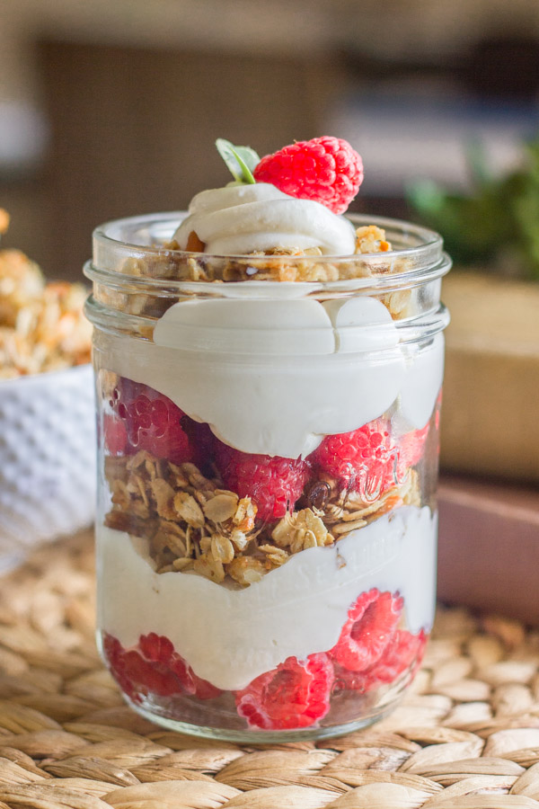 Raspberry Pretzel Granola Parfait in a glass jar.