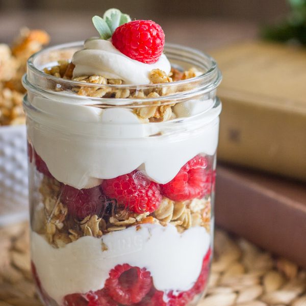 Raspberry Pretzel Granola Parfait - a sweet and salty Pretzel Granola layered with fresh berries and sweet cream yogurt.