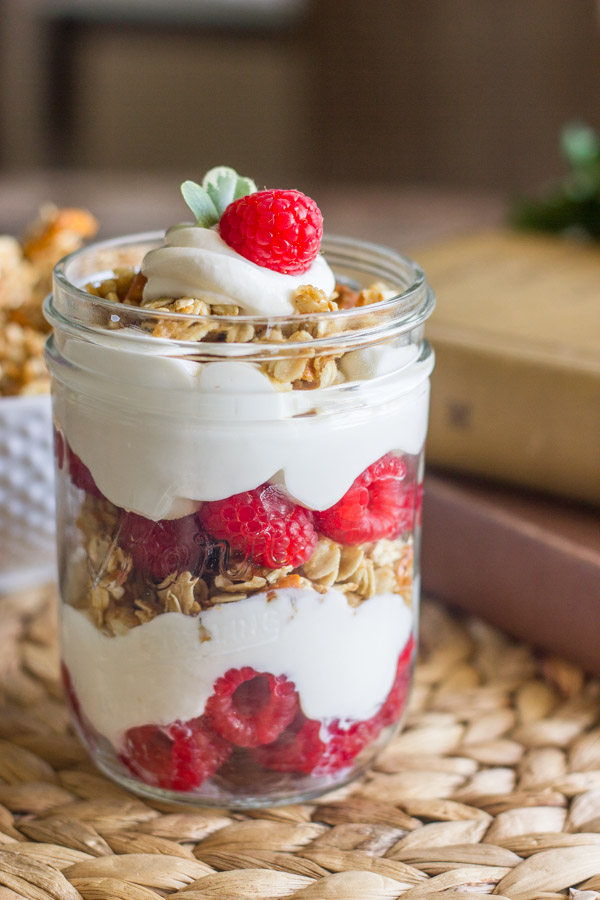 Raspberry Pretzel Granola Parfait - a sweet and salty Pretzel Granola layered with fresh berries and sweet cream yogurt.