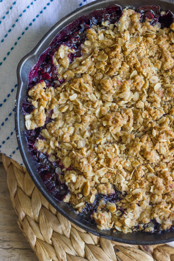 Triple Berry Skillet Crisp in a cast iron skillet.