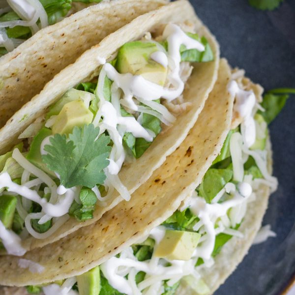 Easy Creamy Crockpot Salsa Verde Chicken - 5 simple ingredients + your crockpot = dinner is done!