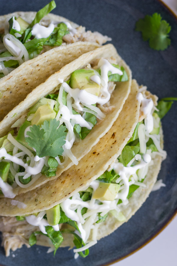 Easy Creamy Crockpot Salsa Verde Chicken - 5 simple ingredients + your crockpot = dinner is done!