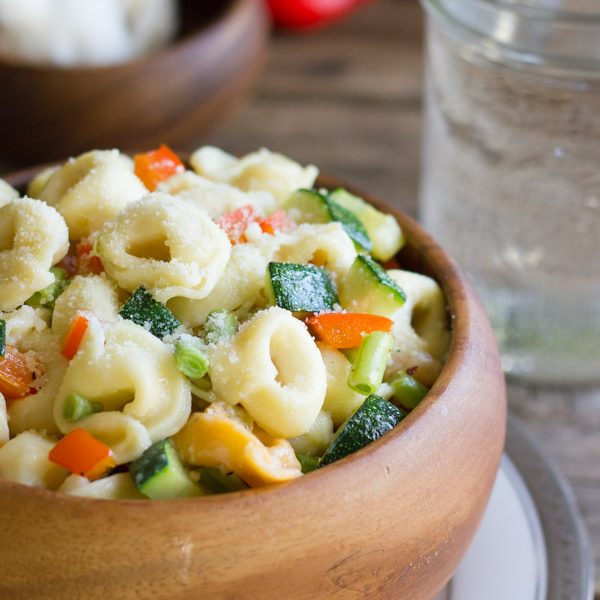 Vegetable Tortellini With Creamy Garlic Sauce - Fresh cheese tortellini meets roasted summer vegetables!