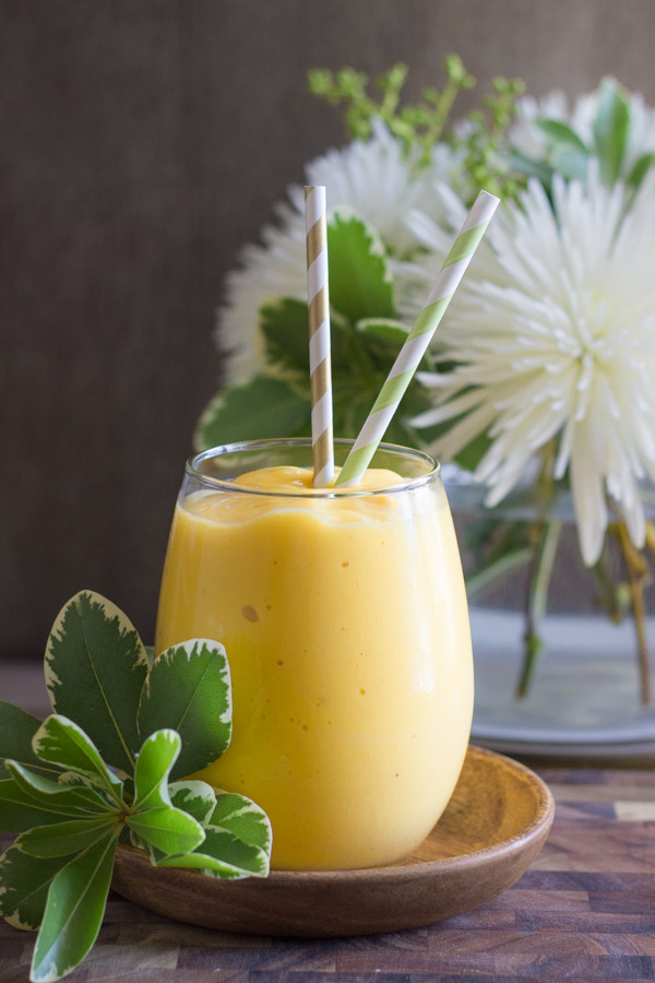 Tropical Sunshine Smoothie - Mangos, pineapple, bananas, orange juice, and a tiny taste of coconut!