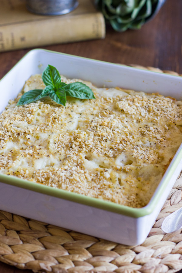 Roasted Garlic Scalloped Potatoes in a square baking dish.