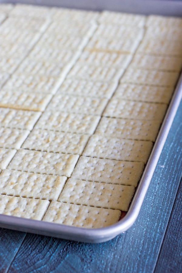 Butter Crackers arranged on a baking sheet.