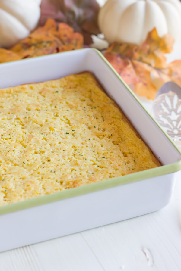 Easy Corn Soufflé in a square baking dish.