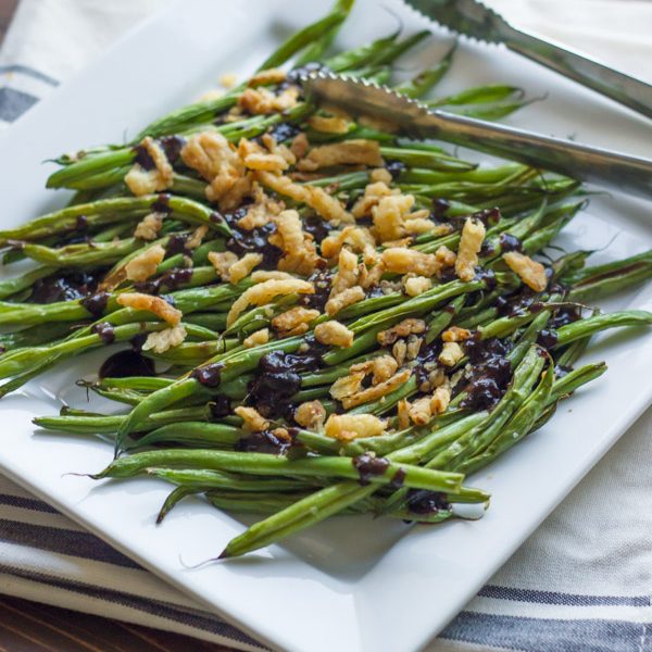 Roasted Green Beans with Creamy Cranberry Balsamic - tangy and sweet fresh green bean side dish topped with french friend onions