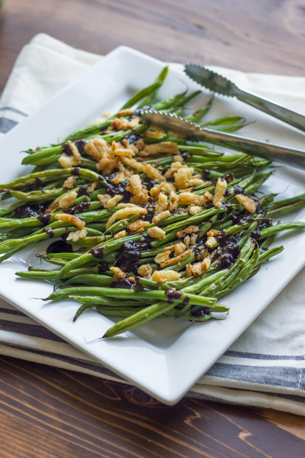 Roasted Green Beans with Creamy Cranberry Balsamic - tangy and sweet fresh green bean side dish topped with french friend onions