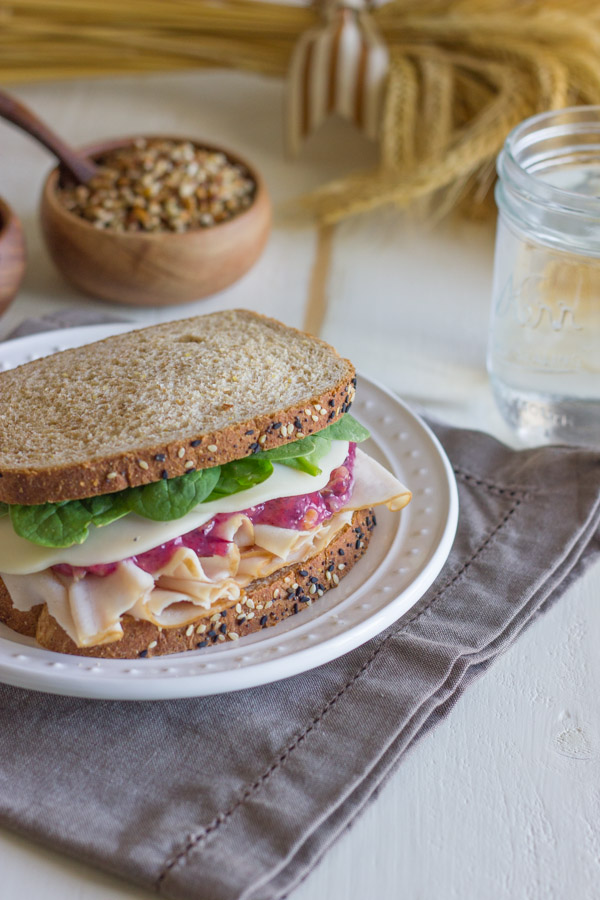 Turkey And Cranberry Sandwich on a plate.