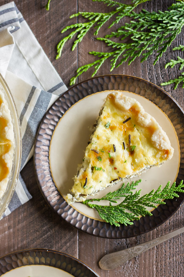 Cheesy Wild Rice Quiche slice on a plate.