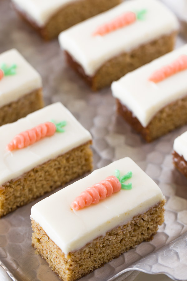 These Carrot Cake Bars with Cream Cheese Frosting are moist, sweet and perfectly spiced!