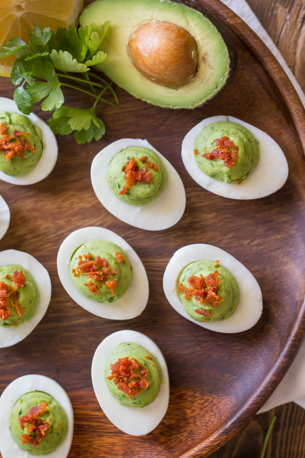 Smoky Bacon Avocado Deviled Eggs - A great way to spice up your traditional Easter menu.