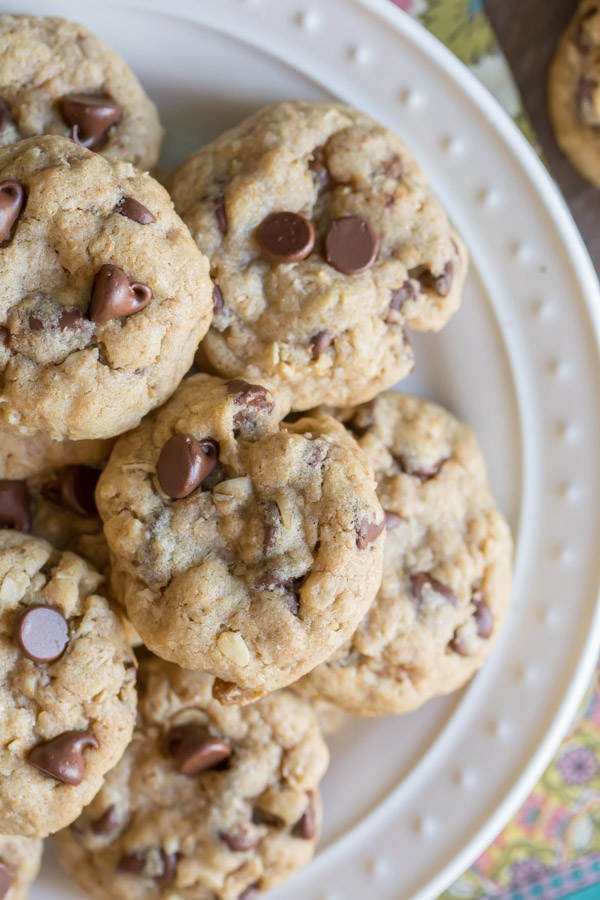 Whole Wheat Oatmeal Chocolate Chip Cookies piled on a white plate.  