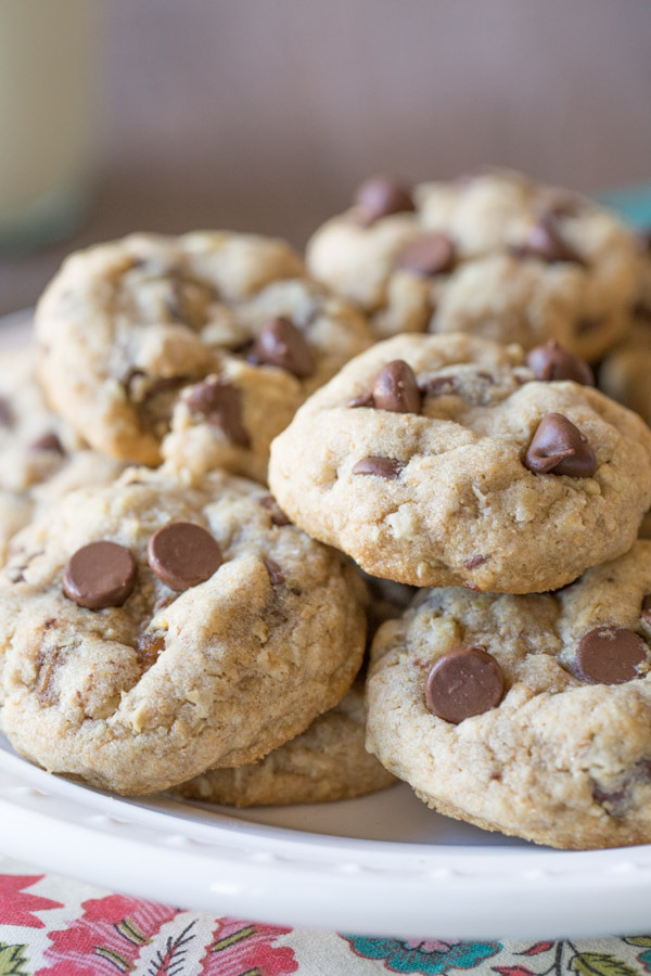 Whole Wheat Oatmeal Chocolate Chip Cookies piled on a white plate.  