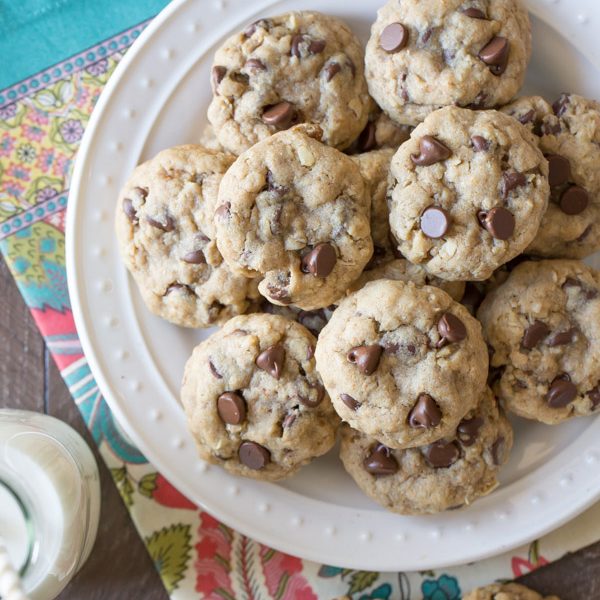 Whole Wheat Oatmeal Chocolate Chip Cookies - These sweet treats are made with white whole wheat flour, oats, and coconut oil, but you'd never know their healthy secret!