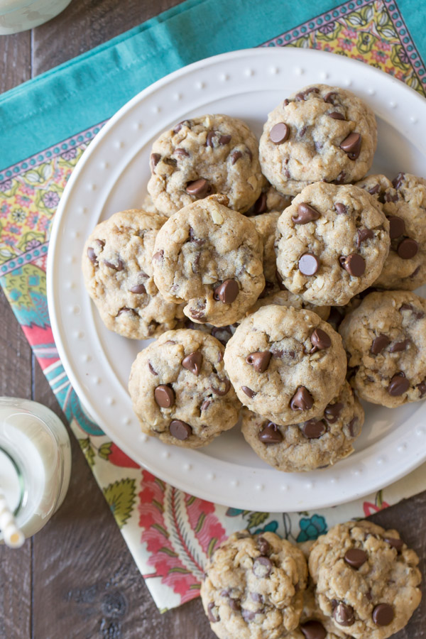 Whole Wheat Oatmeal Chocolate Chip Cookies - These sweet treats are made with white whole wheat flour, oats, and coconut oil, but you'd never know their healthy secret!