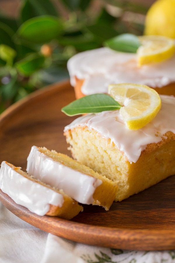 Mini Iced Lemon Pound Cake Loaves - sweet and moist with just the right amount of lemon flavor. Made healthier with coconut oil and Greek yogurt!