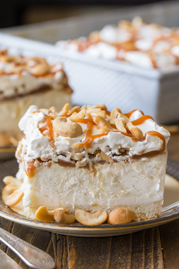 Caramel Cashew Ice Cream Dessert - Creamy vanilla ice cream on a shortbread cookie crust, topped with homemade caramel sauce and cashews of course!