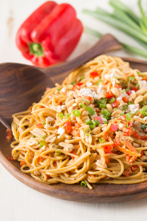 Easy Spicy Peanut Noodles With Chicken - Some pantry staples, a few fresh veggies and the help of a rotisserie chicken make this quick and easy dinner a huge hit!