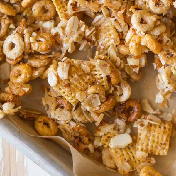 Healthier Coconut Almond Chex Mix - The perfect sweet and salty combo made healthier with coconut oil, honey, oats and almonds!