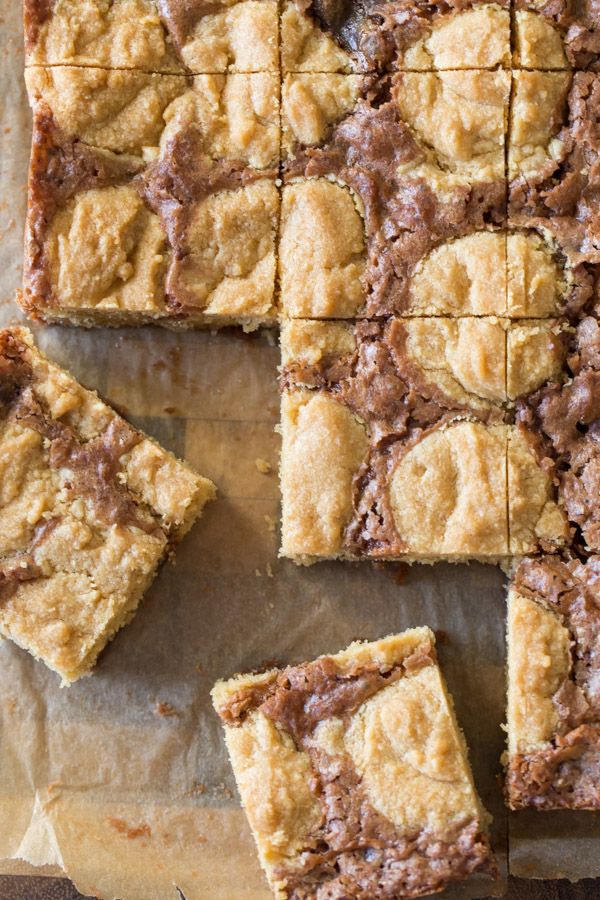 Peanut Butter Cookie Brownies - An easy homemade brownie batter studded with globs of peanut butter cookie dough for a chocolate peanut butter lovers dream come true.