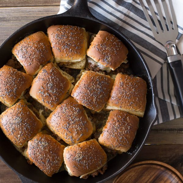 Party Bun Style Sloppy Joes - Just like the ham and cheese party buns everyone loves, but with a sloppy joe type filling. You'll love this quick and easy recipe!