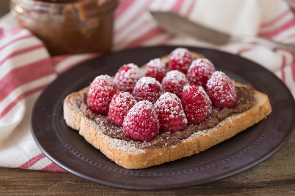 Chocolate Hazelnut Raspberry Toast on a plate.