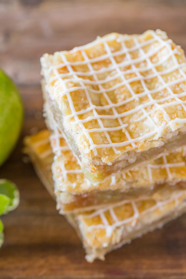 Iced Apple Pie Bars - Perfectly spiced squares of apple pie with crisscross icing on top!