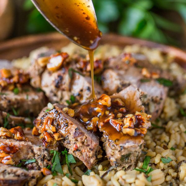 Pork Tenderloin Sweet Chili Pecan Glaze - Peppery pork tenderloin is perfectly complimented by a sweet and slightly spicy buttery pecan glaze. My husband and I are crazy about this one!