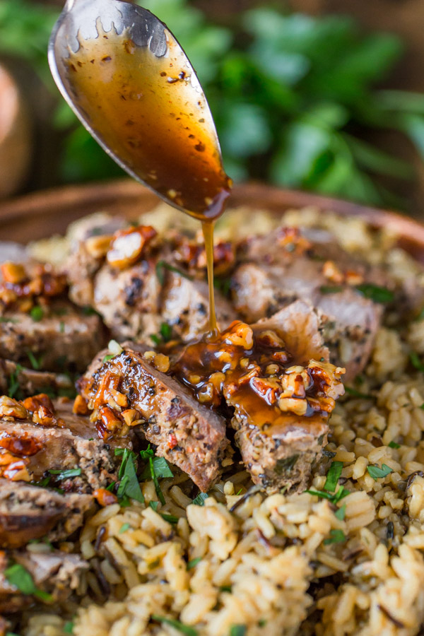 Pork Tenderloin Sweet Chili Pecan Glaze - Peppery pork tenderloin is perfectly complimented by a sweet and slightly spicy buttery pecan glaze. My husband and I are crazy about this one!