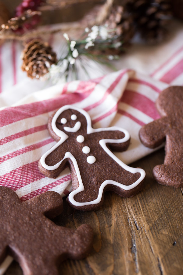 Gingerbread Men Chocolate Cut-Out Cookies decorated with icing.